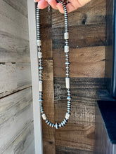 Load image into Gallery viewer, Graduated Barrel Bead Necklace – 24 Inch – Sterling Silver Saucer & Barrel Beads