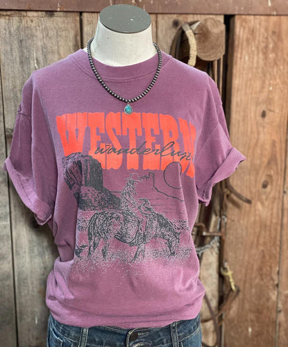 Mannequin dressed in the purple berry washed tee. Western is printed in  burnt orange horse and rider is black