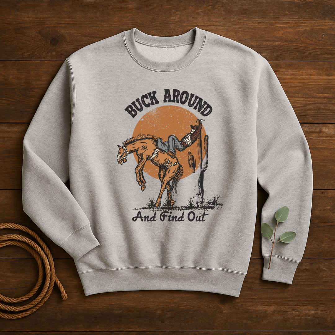 Gray sweatshirt with a graphic of two horses and text on a wooden surface