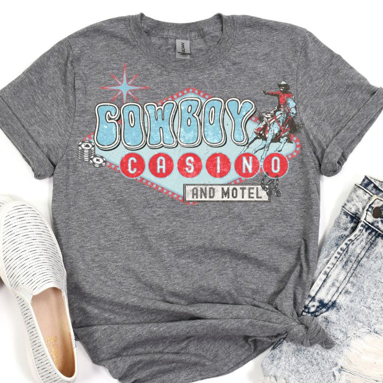 Gray t-shirt with 'Cowboy Casino and Motel' graphic design on a white background