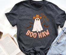 Load image into Gallery viewer, Dark gray t-shirt with a ghost wearing a cowboy hat and 'BOO HAW' text on a white surface.
