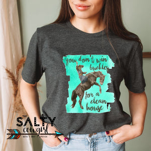 You Don't Win Buckles for a Clean House Tee - The Salty Cowgirl